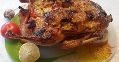 Утка с яблоками, апельсинами и вялеными помидорами в духовке