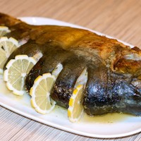 Карп с овощами в духовке