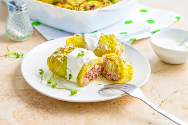 Голубцы в сметанном соусе в духовке Голубцы в сметанном соусе в духовке