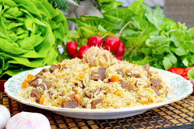 Плов в афганском казане на плите Плов в афганском казане на плите