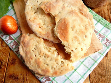 Узбекская катлама с луком лепешки из слоеного теста Узбекская катлама с луком лепешки из слоеного теста