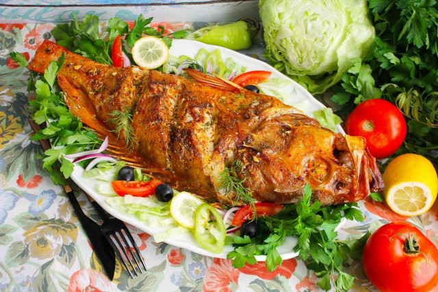 Морской окунь запечённый в духовке целиком Морской окунь запечённый в духовке целиком