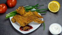 Курячі крильця в паніровці на сковороді