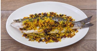 Сибас с орехами и изюмом в духовке