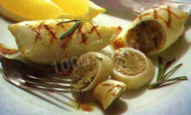 Фаршированные фаршем кальмары с анчоусами в духовке