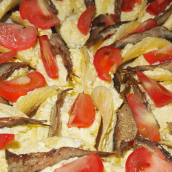 Закуска шпроты на чипсах