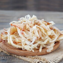 Сушёные кальмары в домашних условиях: рецепт — Лайфхакер