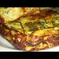 Запеканка из КАБАЧКОВ!и молоко. сыр. на терке. не отжимает. манка 2 ст л. 4яй