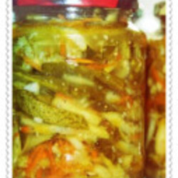 Огурцы резаные Томины с луком