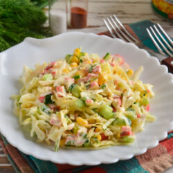 Салат из крабовых палочек с капустой, кукурузой и огурцом