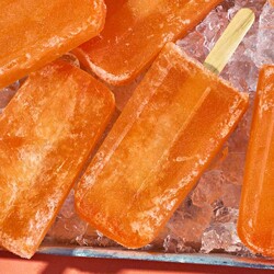 These Easy-to-Make Aperol Spritz Popsicles Taste Like an Italian Sunset
