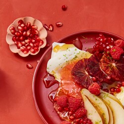 Fresh Red Citrus Salad with Berries, Pears and Pomegranates