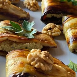 Как приготовить рулетики из баклажанов с орехами