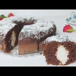 Babka czekoladowa z kokosem. Miękka, wilgotna i puszysta w polewie czekoladowej. Przepis bez masla