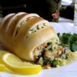 Кальмары, фаршированные мидиями, овощами и кус-кусом