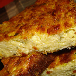 Запеканка из тертого картофеля с сыром и чесноком