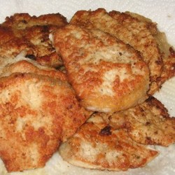 Свиные отбивные в луковом соусе