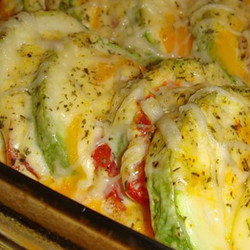 Кабачки с помидором и сыром в духовке.