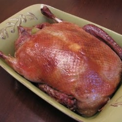 Утка с рисом, яблоками и апельсинами