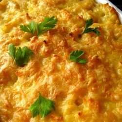 Рецепт: Макароны, запеченные с помидорами под сыром