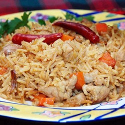 Свинина с рисом, разными овощами и специями