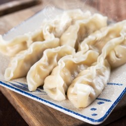 Китайские пельмени на пару с начинкой из свиного фарша и тушеной капусты - рецепт RussianFood