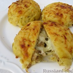 Запечённое мясо в картофельной шубке
