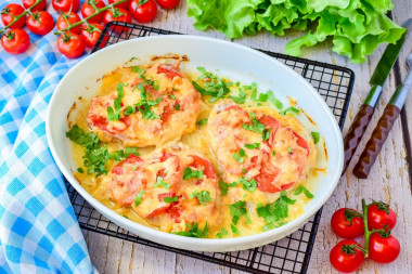 Стейки из свинины с сыром и помидорами в духовке