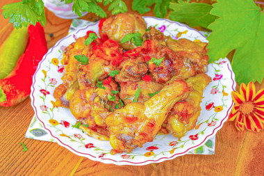 Куриные крылышки в казане на костре