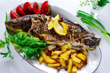 Карп с картошкой и лимоном в духовке
