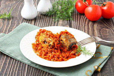 Минтай в духовке с луком и морковью