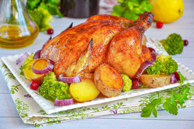 Курица с хрустящей корочкой запеченная в духовке целиком
