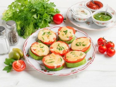 Кабачки в духовке с сыром и помидорами