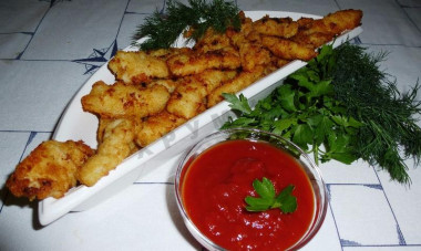 Кальмары в панировочных сухарях