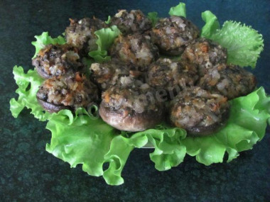 Фаршированные шампиньоны в духовке с сыром