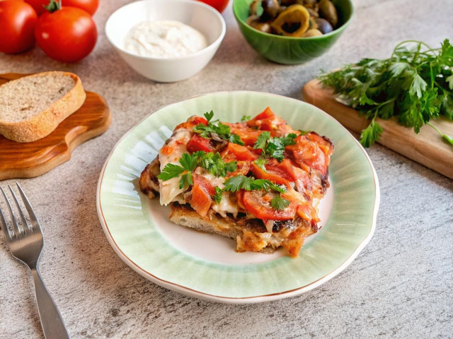 Баклажаны с куриным филе и помидорами в духовке