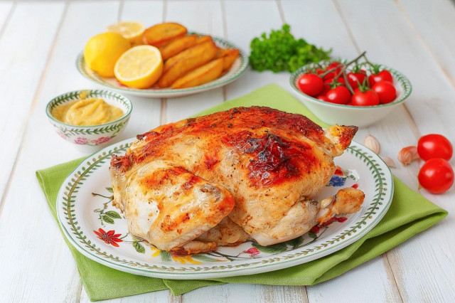 Курица в духовке целиком с яблоками фаршированная