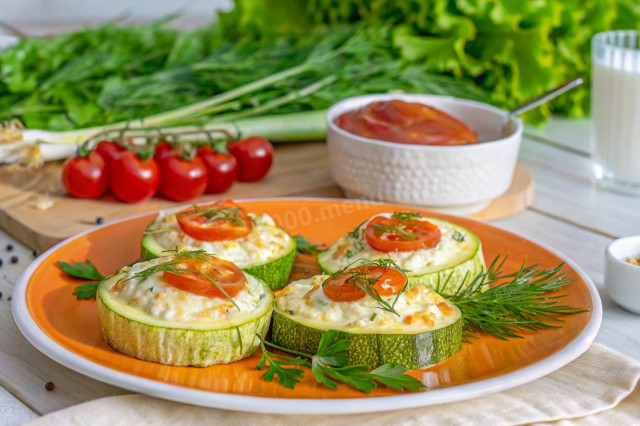 Кабачки, фаршированные курицей, помидорами и сыром в духовке